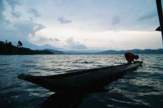 “Man and Boat” • Kodak Ektachrome E100 • Canon Rebel K2 35mm • Sigma 24-70mm f2.8 •••#boat #treetrunk #canoe #lake #uganda #film #filmphotography #kodak #ektachrome #E100 #Uganda #Africa #sunset #photography
